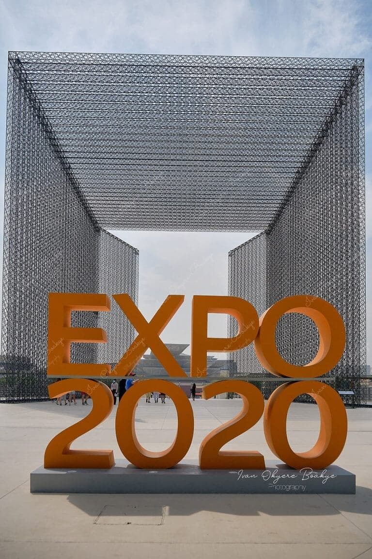 Day time view of the EXPO 2020 sign in front of the Opportunity Portal structure at the entrance of the Dubai Expo site, Dubai, UAE