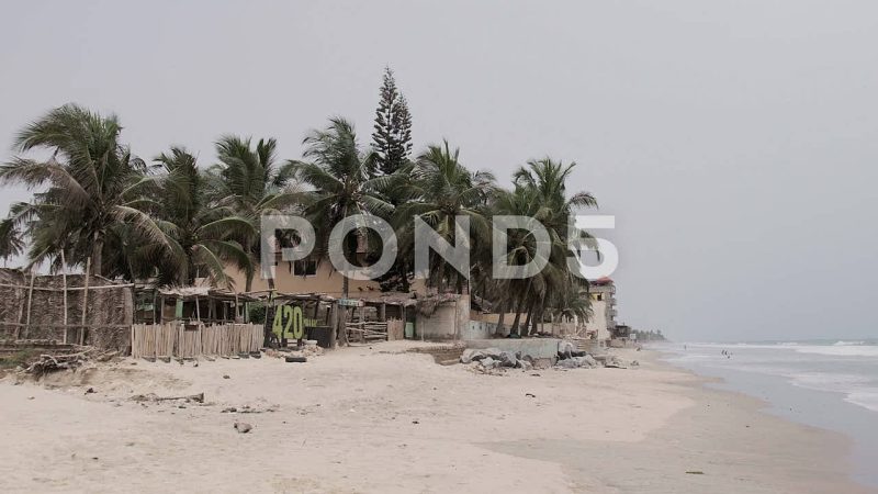 View Of Beach Bar, Palm Trees And Waves At Kokrobite Beach, Ghana View Of Beach Bar, Palm Trees And Waves At Kokrobite Beach, Ghana