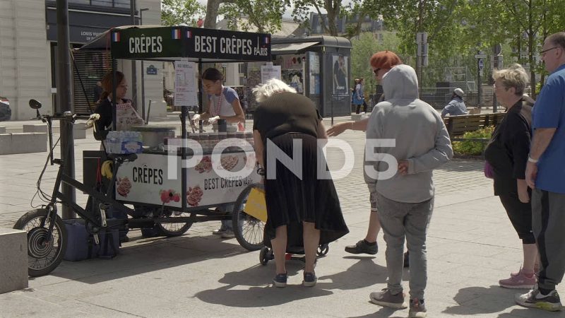 Outdoors Crepes Street Vendors And Customers, Paris, France Outdoors Crepes Street Vendors And Customers, Paris, France