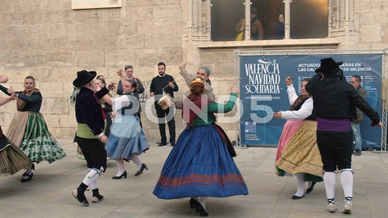 Men And Women Traditional Spanish Dancing In Street, Valencia, Spain Men And Women Traditional Spanish Dancing In Street, Valencia, Spain