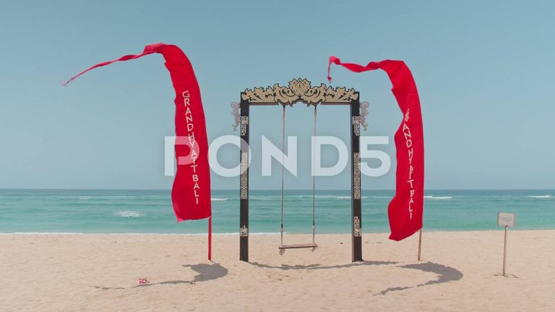 Beach Swing And Red Banners , Nusa Dua, Bali Beach Swing And Red Banners , Nusa Dua, Bali