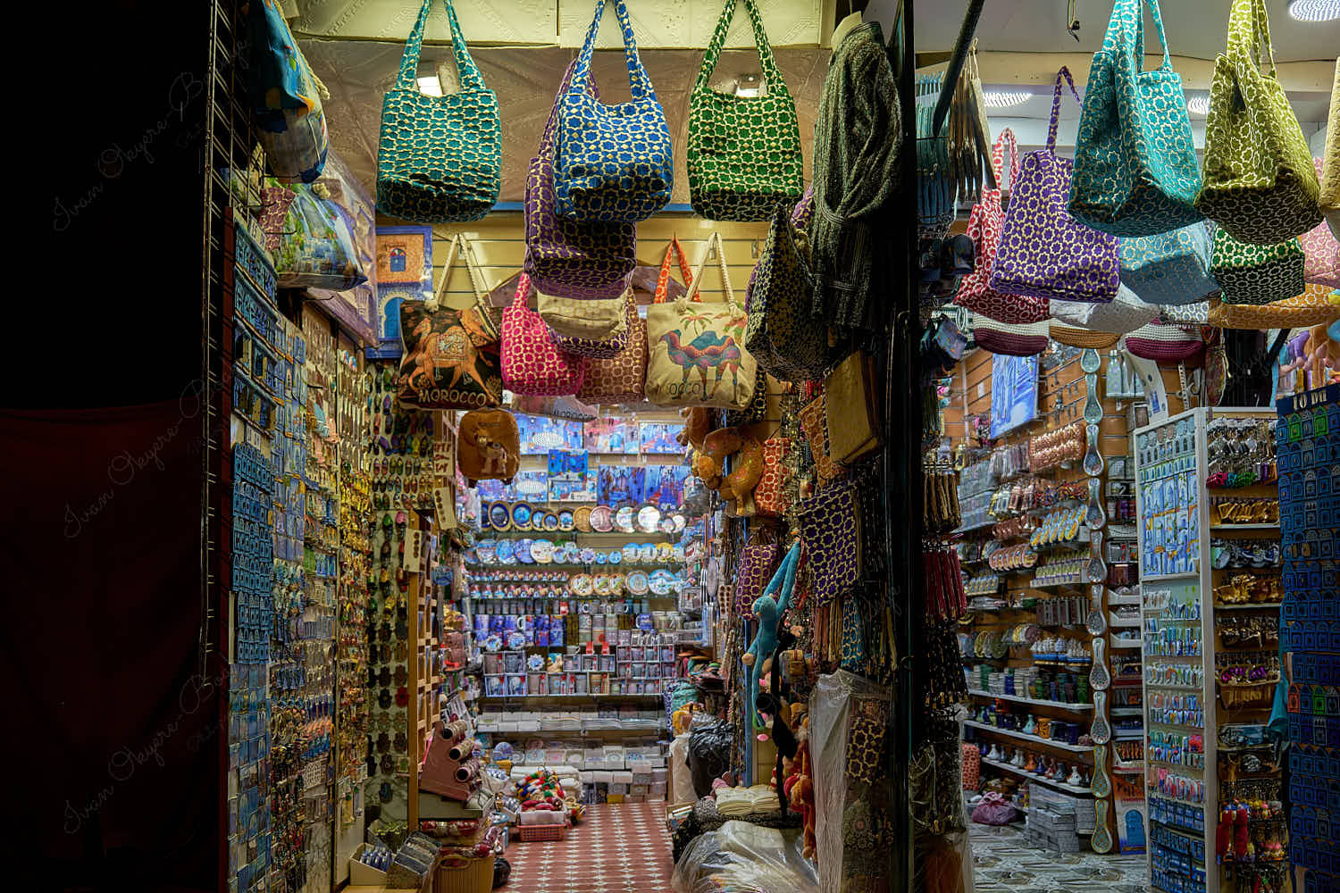 Souvenirs stall selling ladies purses, handbags, fridge magnets, cups and other gifts, Chefchaouen, Morocco