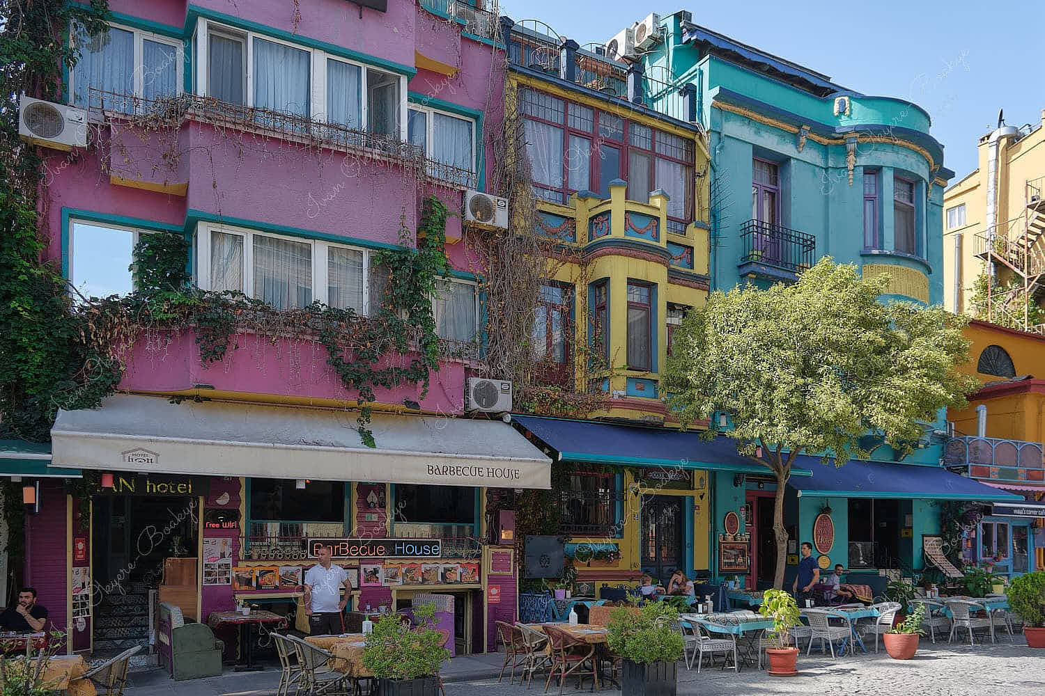 Colourful vibrant facades of BarBecue House and Kybele Café restuarants, Istanbul, Turkey
