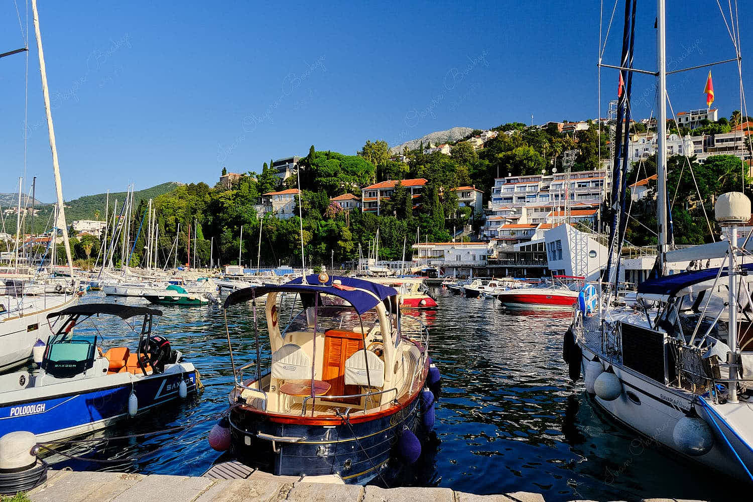Marina view of bobbing boats and mountains, Herceg Novi, Montenegro