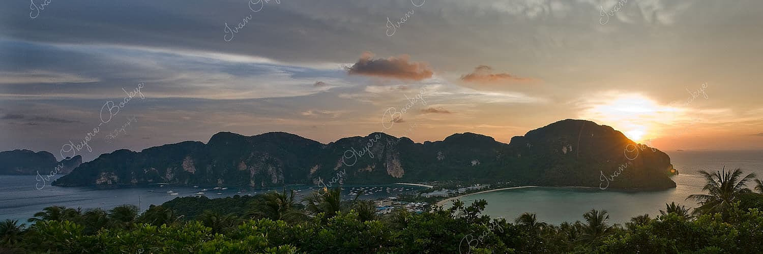 A panoramic sunset seascape view of the beaches on both sides of Koh Phi Phi from Pee Pee Viewpoint, Koh Phi Phi, Thailand