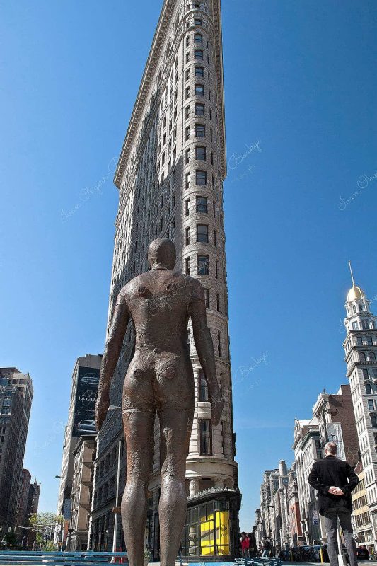 Antony Gormley Naked Man Statue outside Flatiron Building during Event Horizon project in New York, America