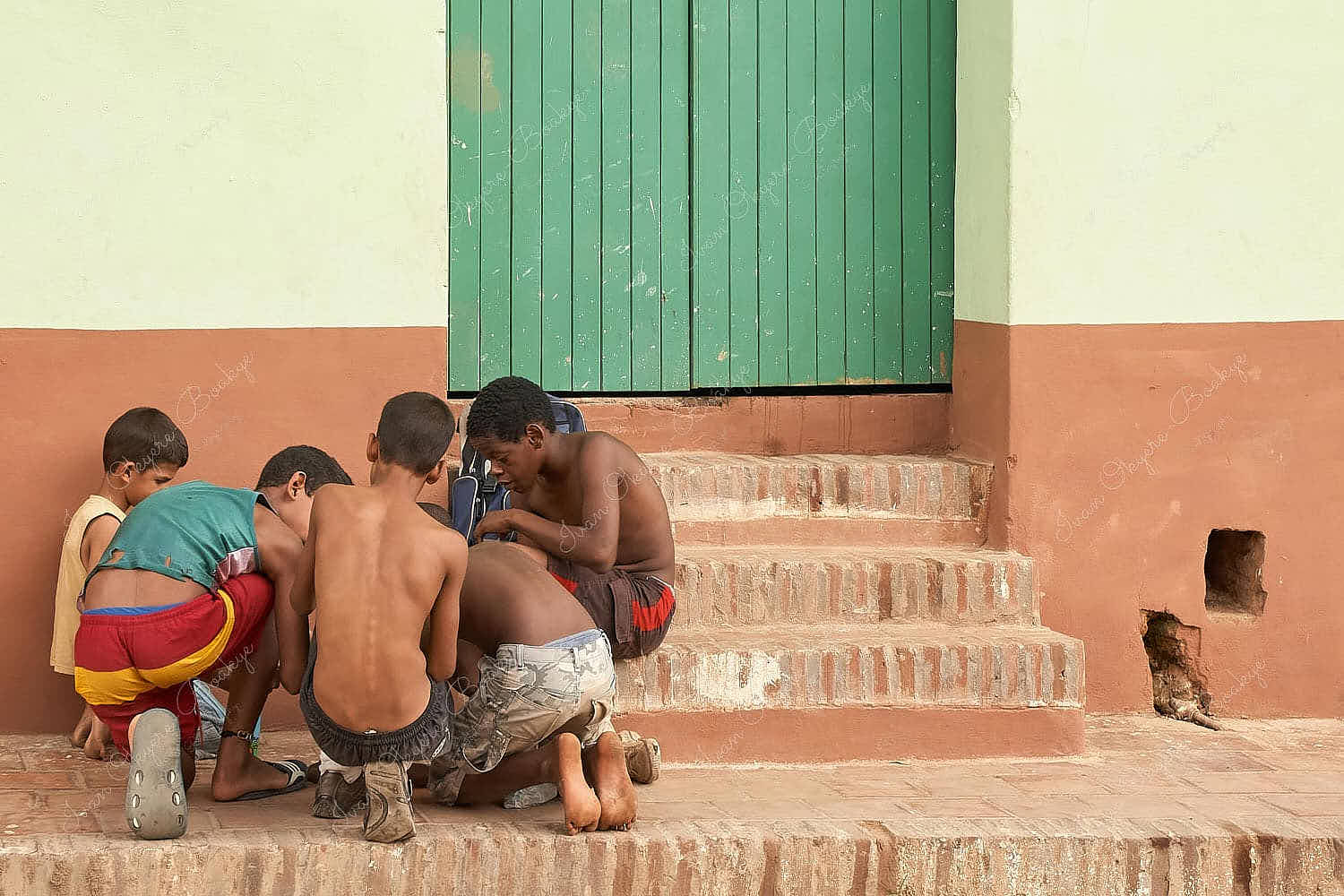 Boys playing in the streets in Trinidad, Cuba