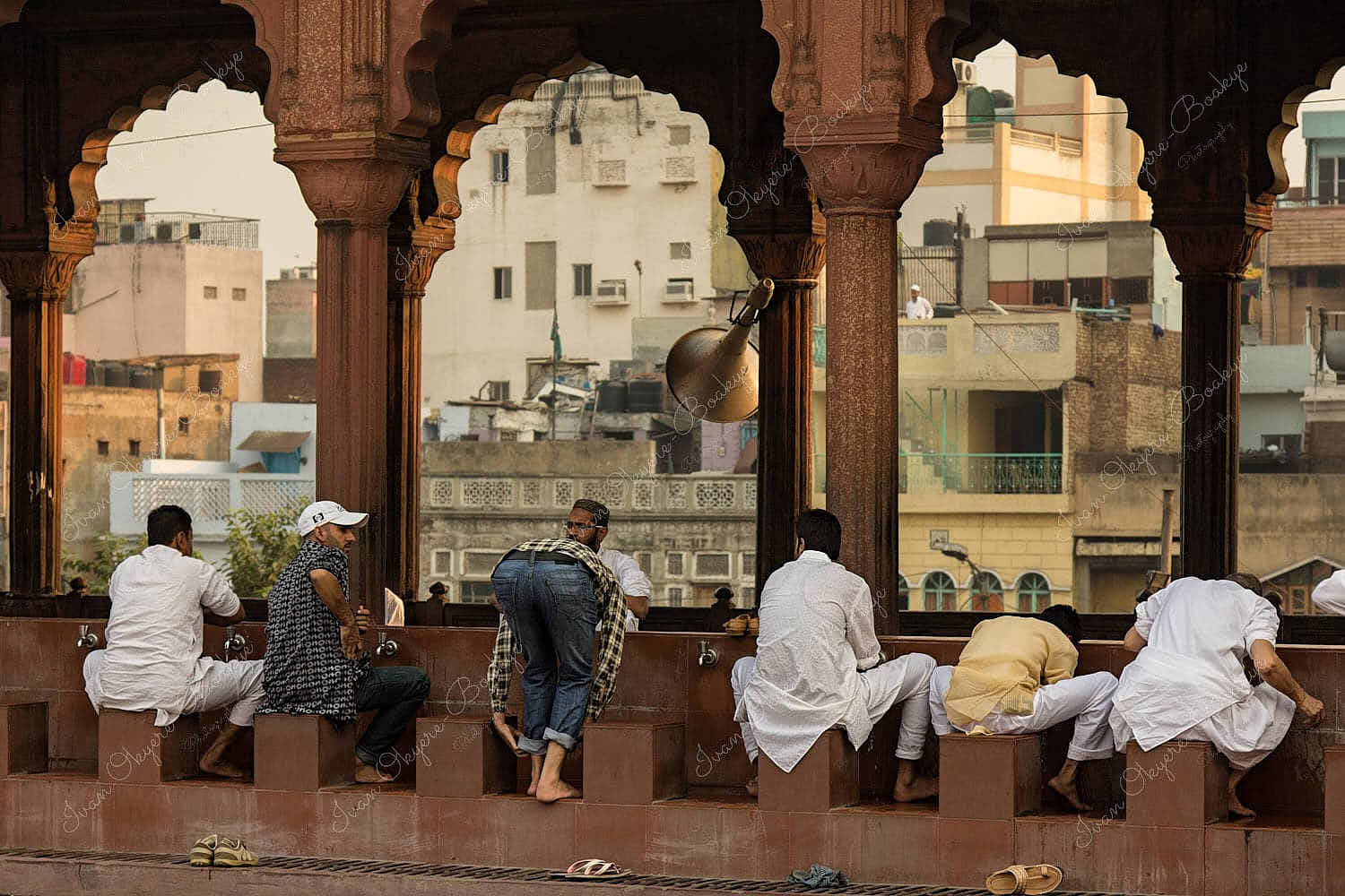 Worshippers performing Wudhu outside Jama Masjid Mosque in Delhi, India