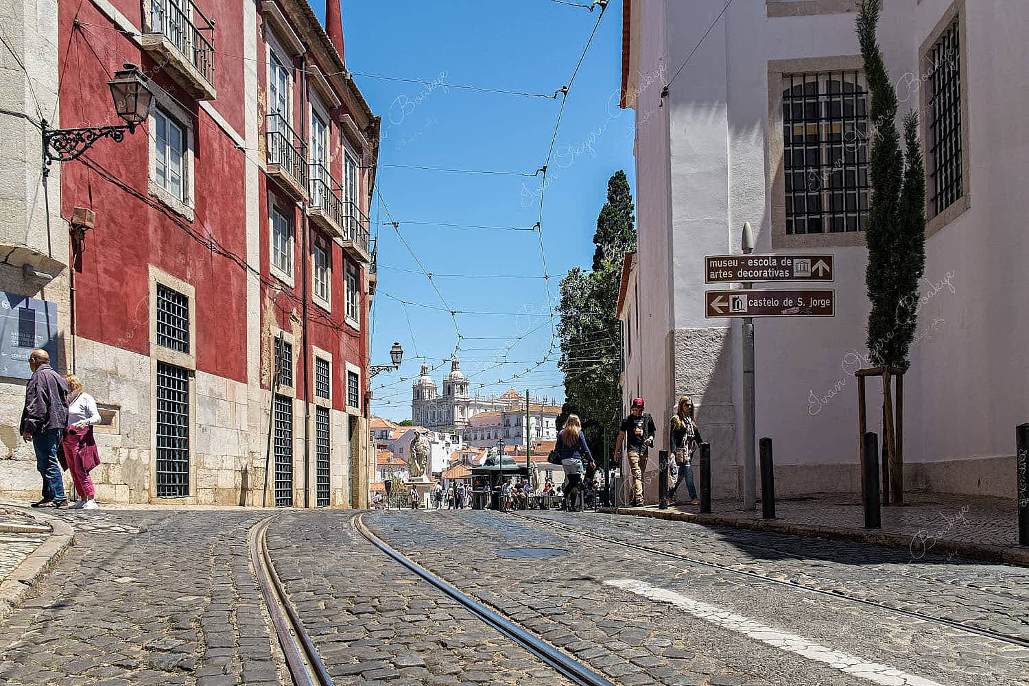 View of São Vicente de Fora and the tram lines and tracks in the streets of Alfama, Lisbon, Portugal