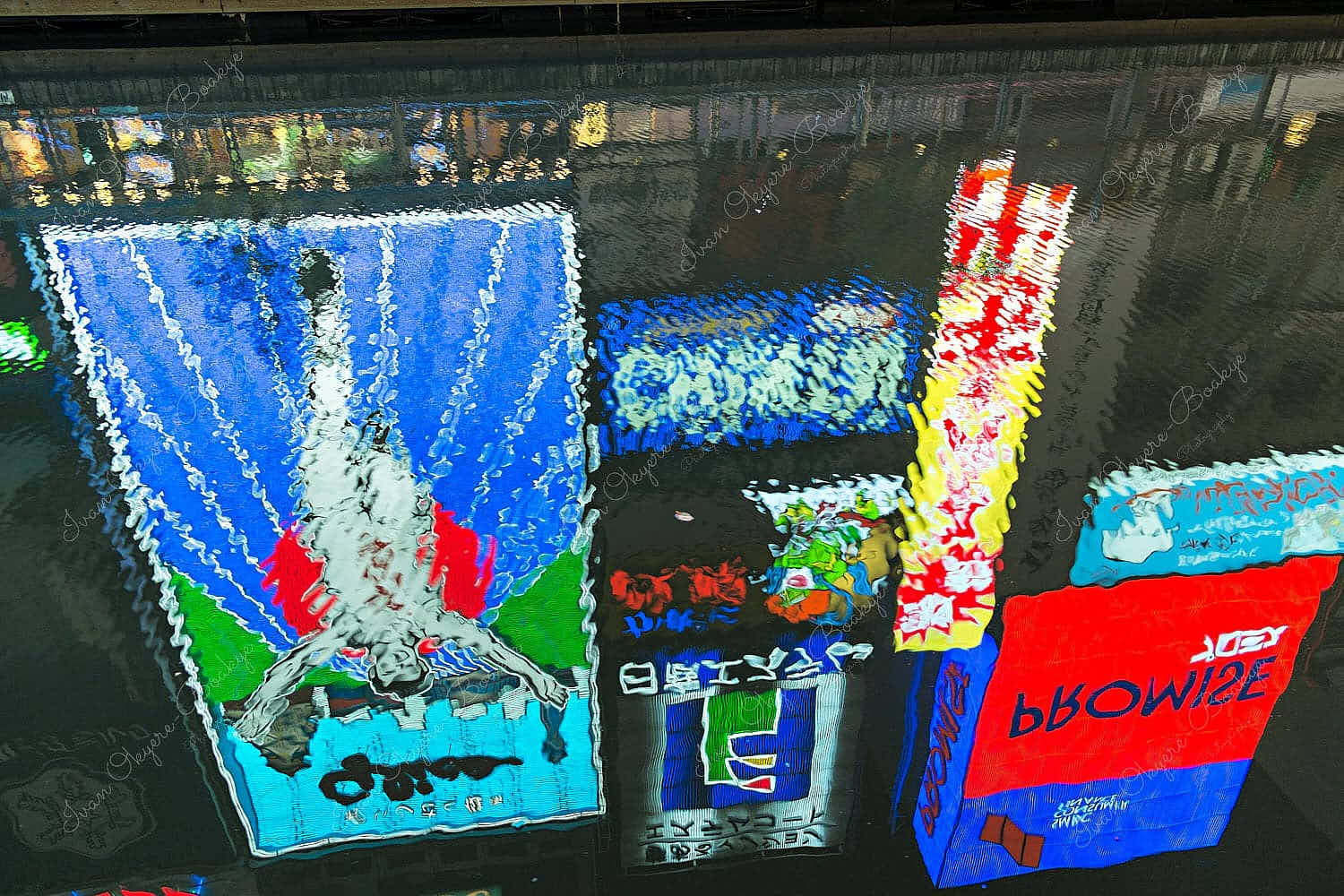 Reflections of the Glico Running Man and other neon advertisement signs in Dotonbori Canal, Osaka, Japan