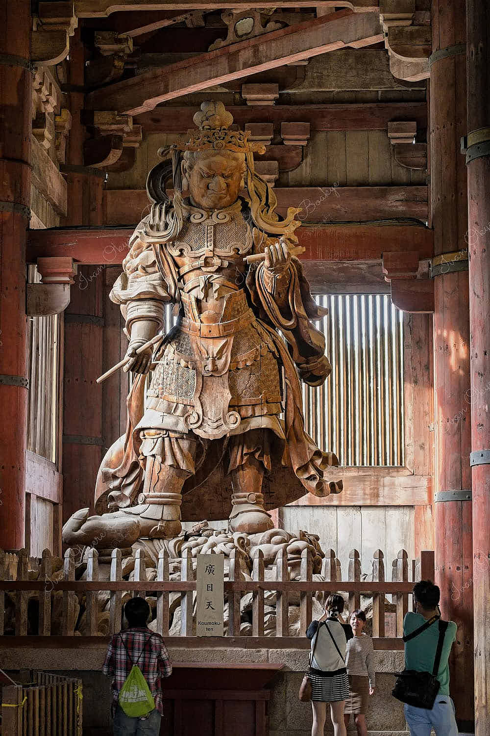 A gigantic Koumokuten (Guardian King) statue in the Daibutsuden (Big Buddha Hall) of Tōdaiji (Great Eastern Temple) in Nara, Japan