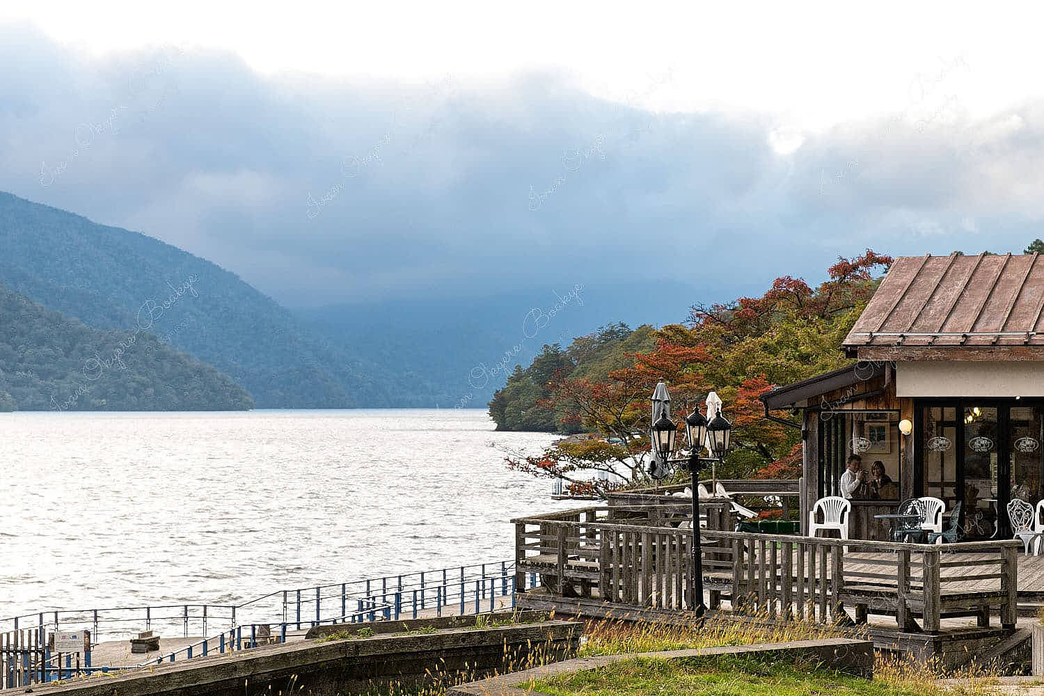 View of Lake Chuzenji and mountain landscape at Chuzenjiko Onsen Town, Nikko, Japan
