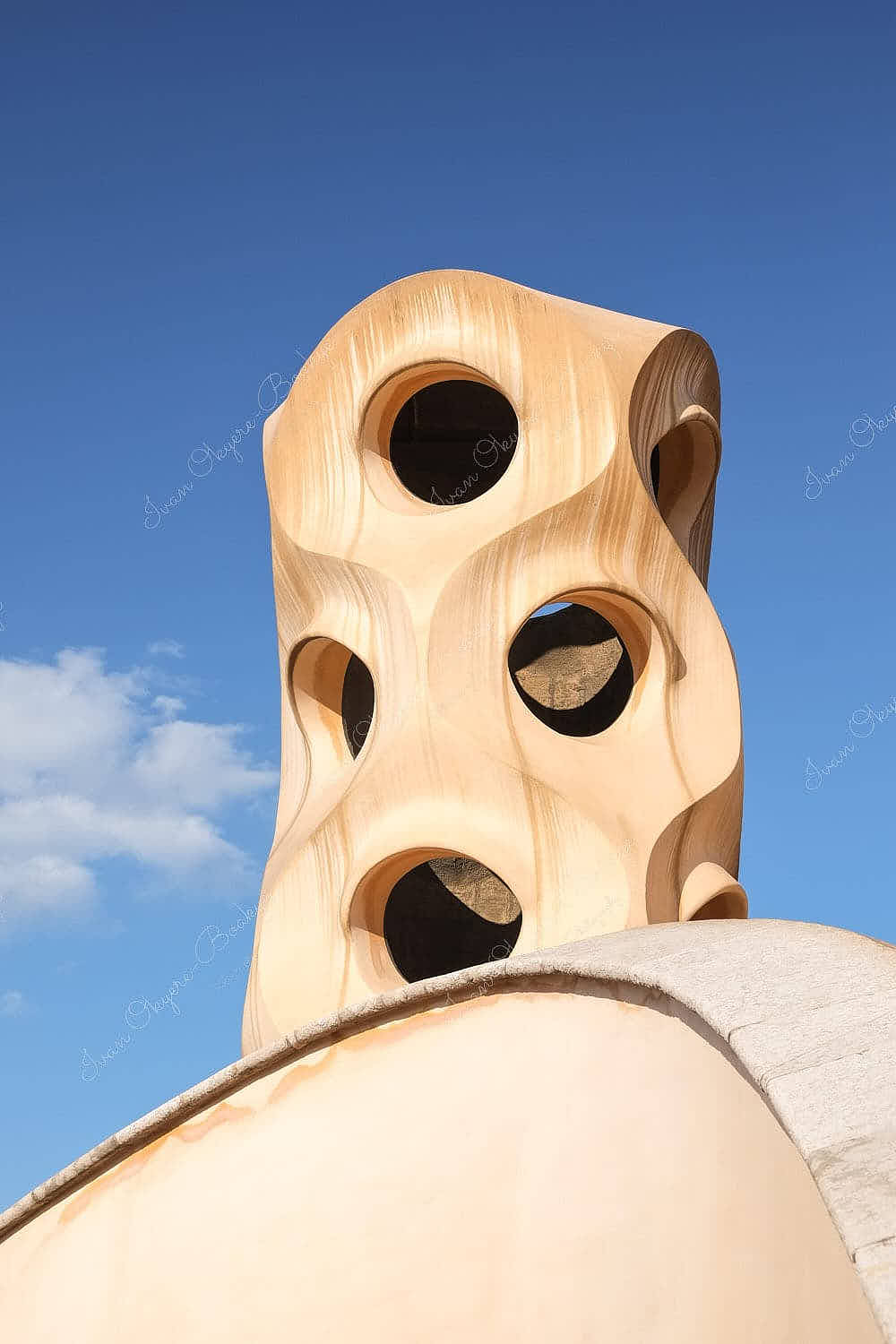 Antoni Gaudí styled chimneys on roof of La Pedrera, Barcelona, Spain