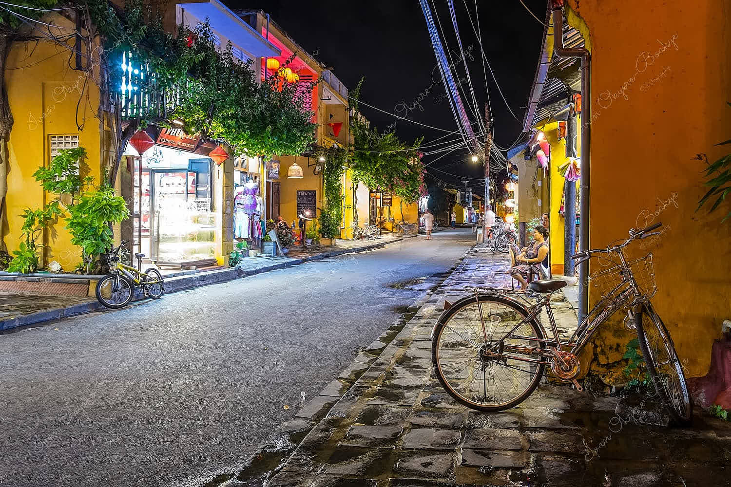 Night view of shopping street in old town of Hoi An, Vietnam