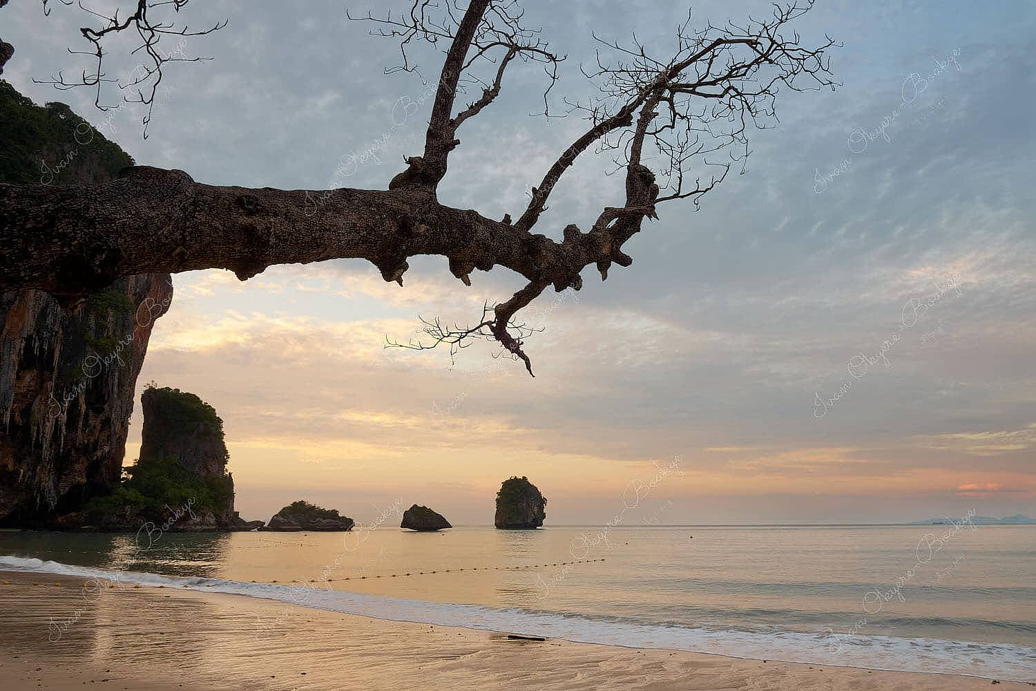 Empty Hat Tham Phra Nang beach at sunrise in Railey, Krabi, Thailand