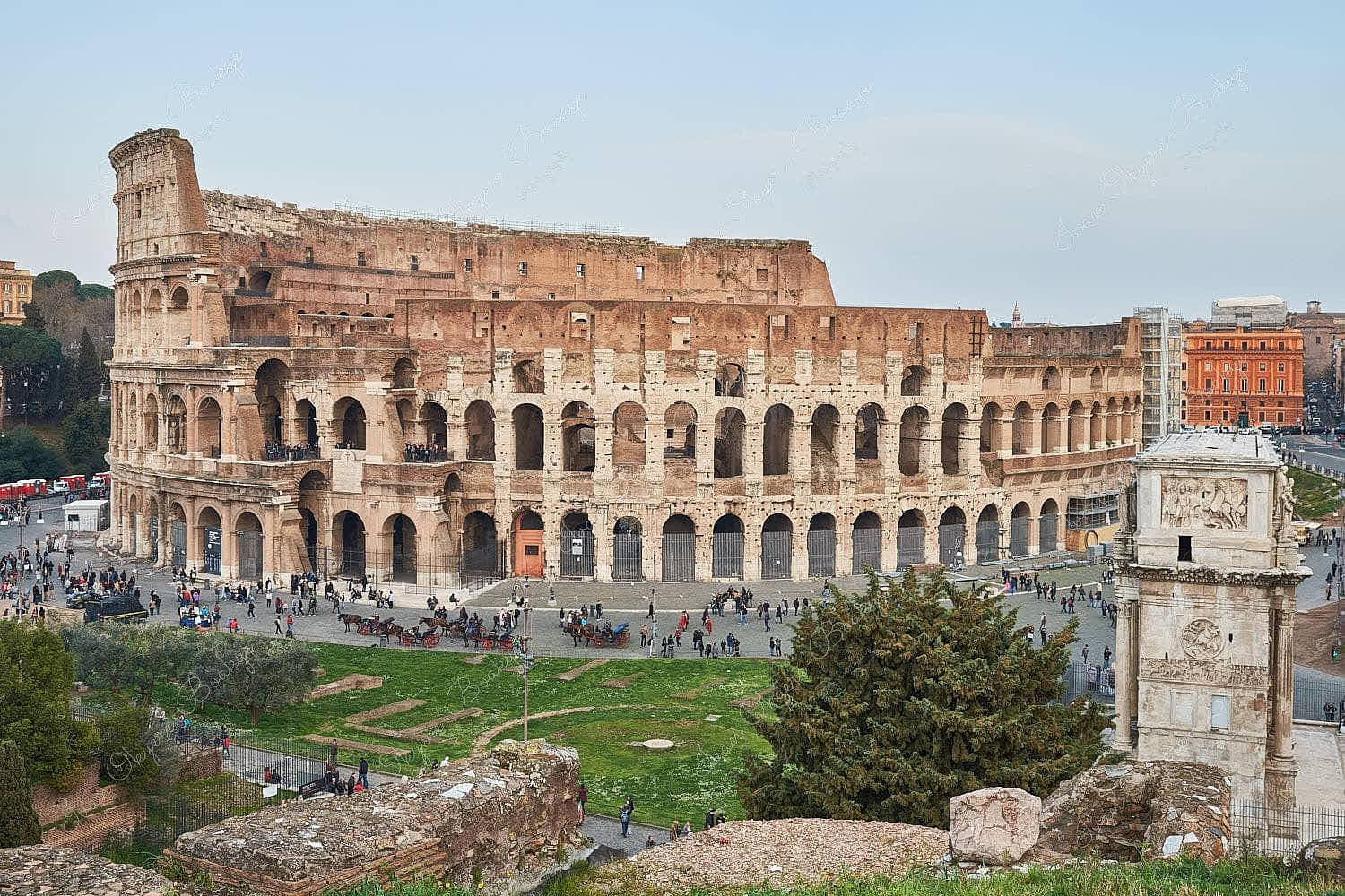 The Arch of Constantine and The Colosseum in Rome, Italy