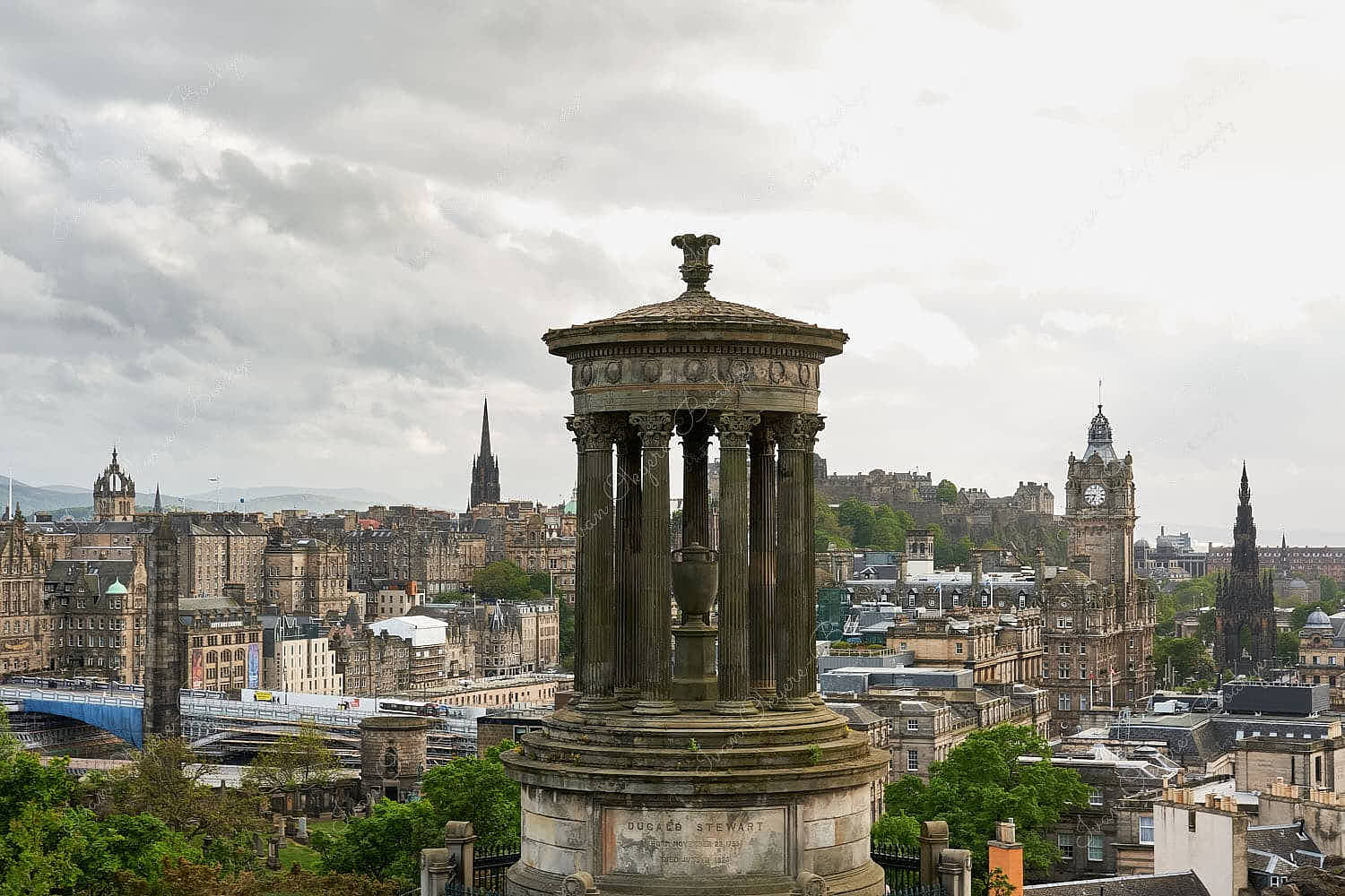Balmoral Hotel clock tower, Edinburgh Castle, Scott Monument, and St Giles’ Cathedral from Calton Hill in Edinburgh, Scotland, UK
