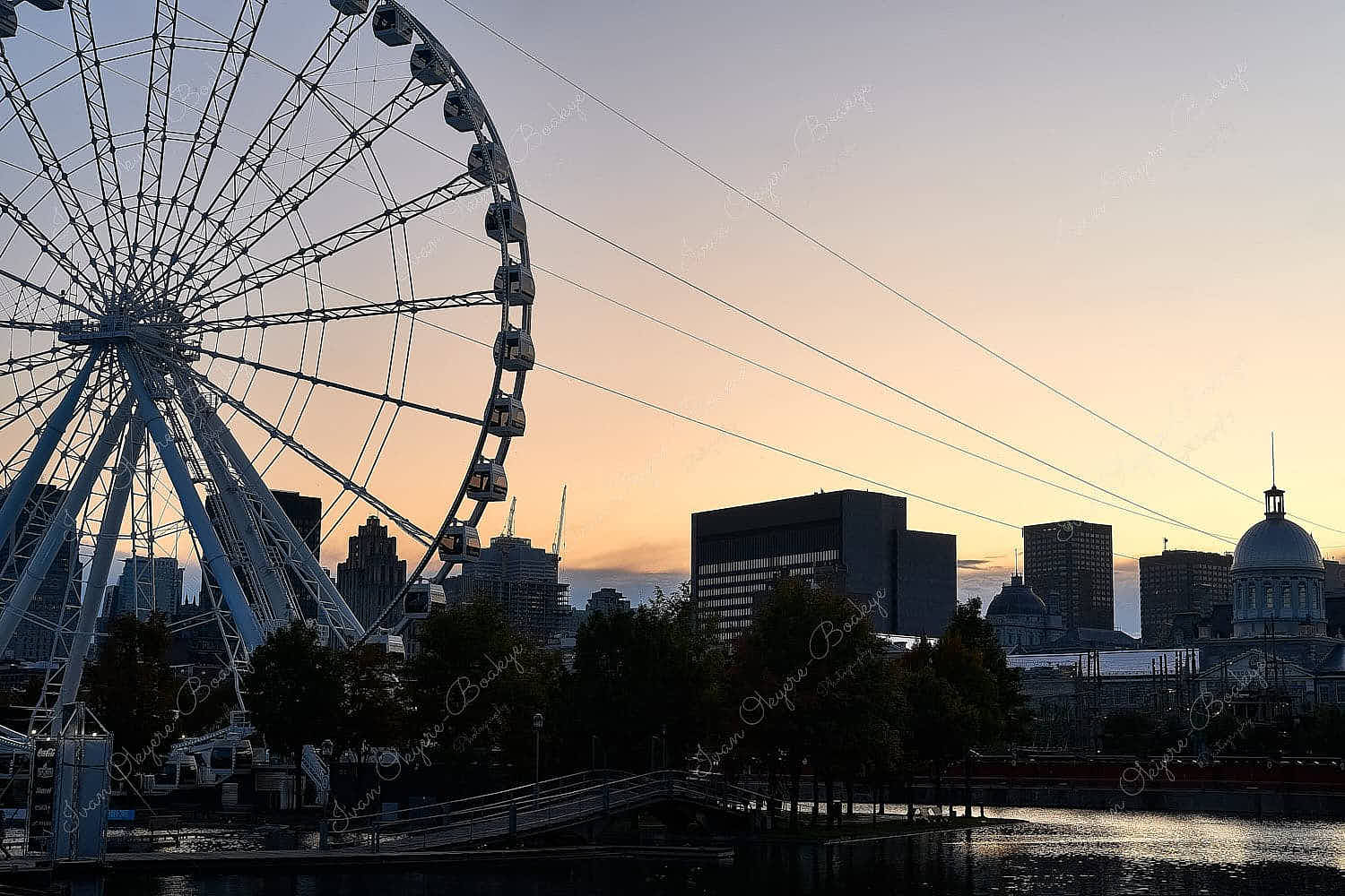 Sunset view of the La Grande Roue de Montreal at the Old Port in Montreal, Quebec, Canada