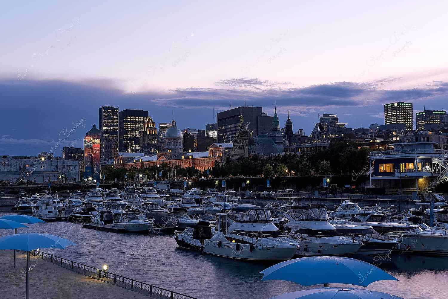 View of the beach and marina at the Old Port in Montreal at dusk, Montreal, Quebec, Canada