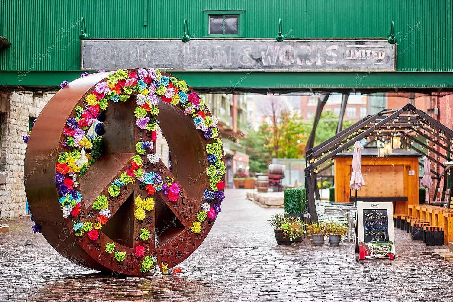 A wheel of flowers in the trendy side streets of the Distillery District, Toronto, Canada