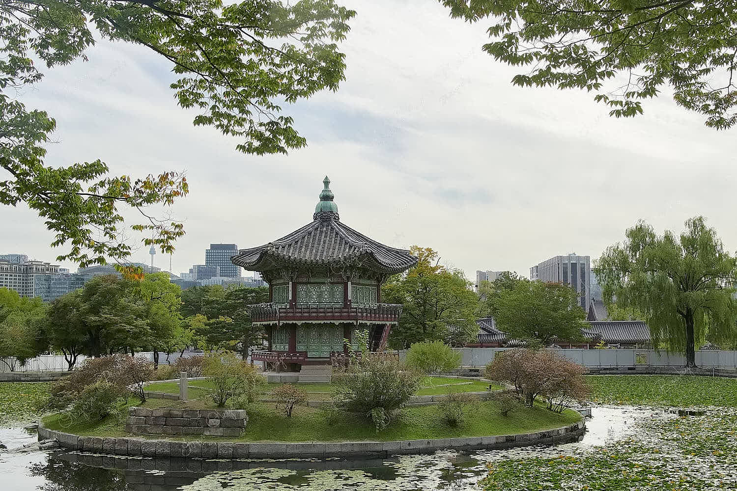 The ornately decorated Hyangwonjeong Pavilion in Gyeongbokgung Palace, Seoul, South Korea