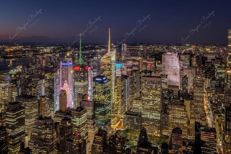 Panorama of skyscrapers in Manhattan skyline at night, New York, America