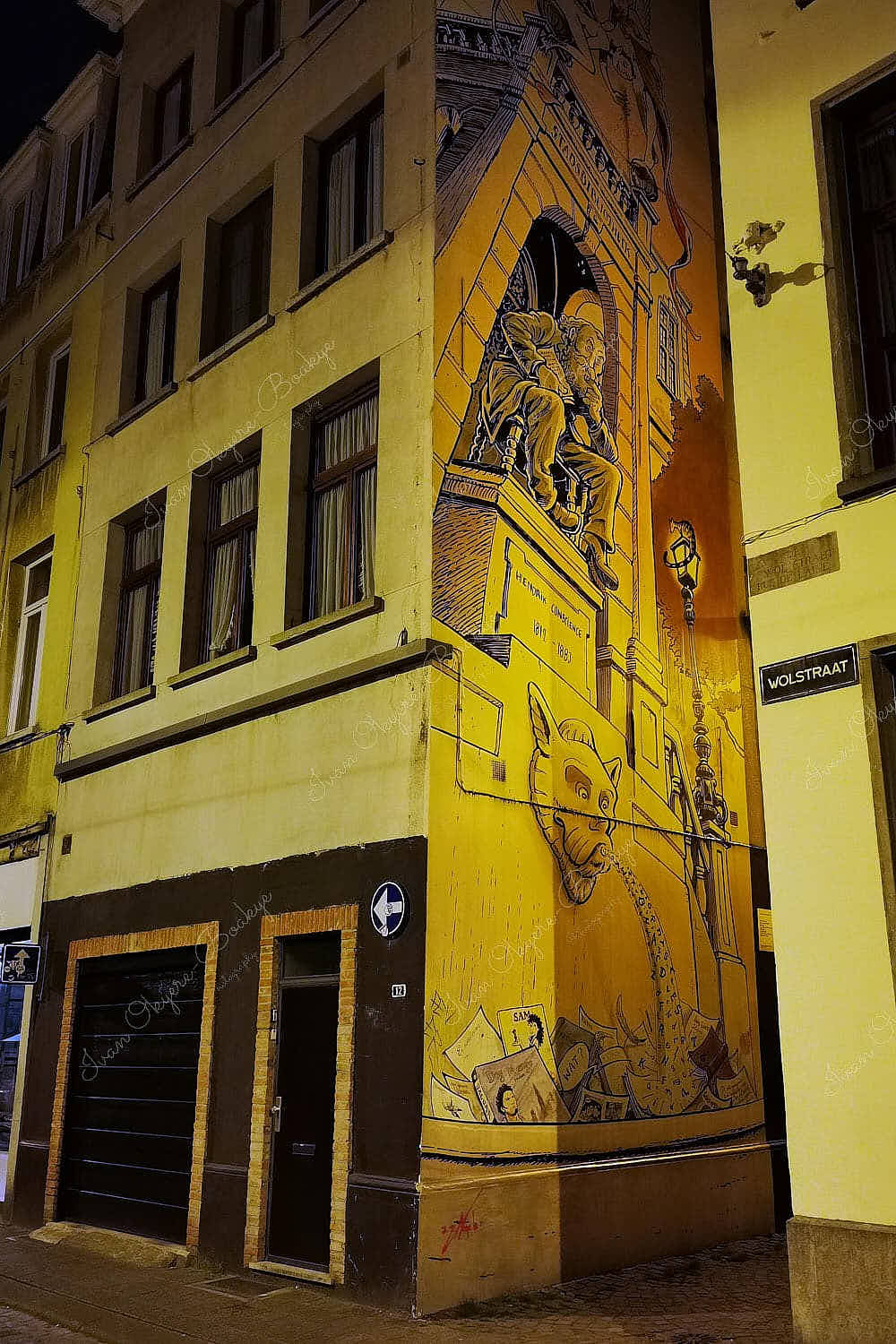 A large street mural on the side of a building of the Flanders literature pioneer Hendrik Conscience, Antwerp, Belgium