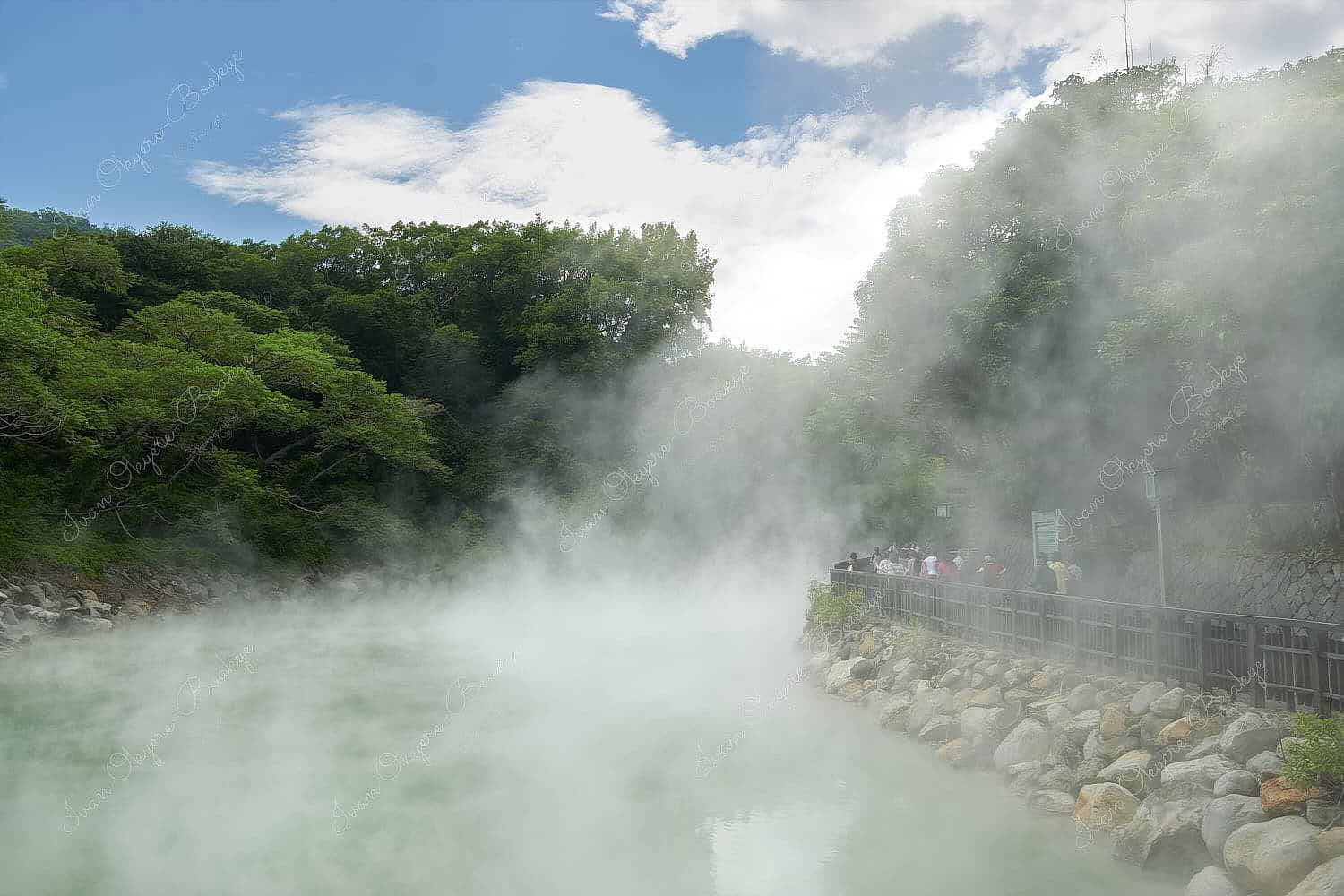 Vapours rising in the breeze at the hot spring in Beitou Park thermal valley, Taiwan